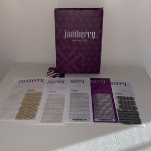 Jamberry mini heater and 5 nail wraps. Only 1 nail wrap has some missing.